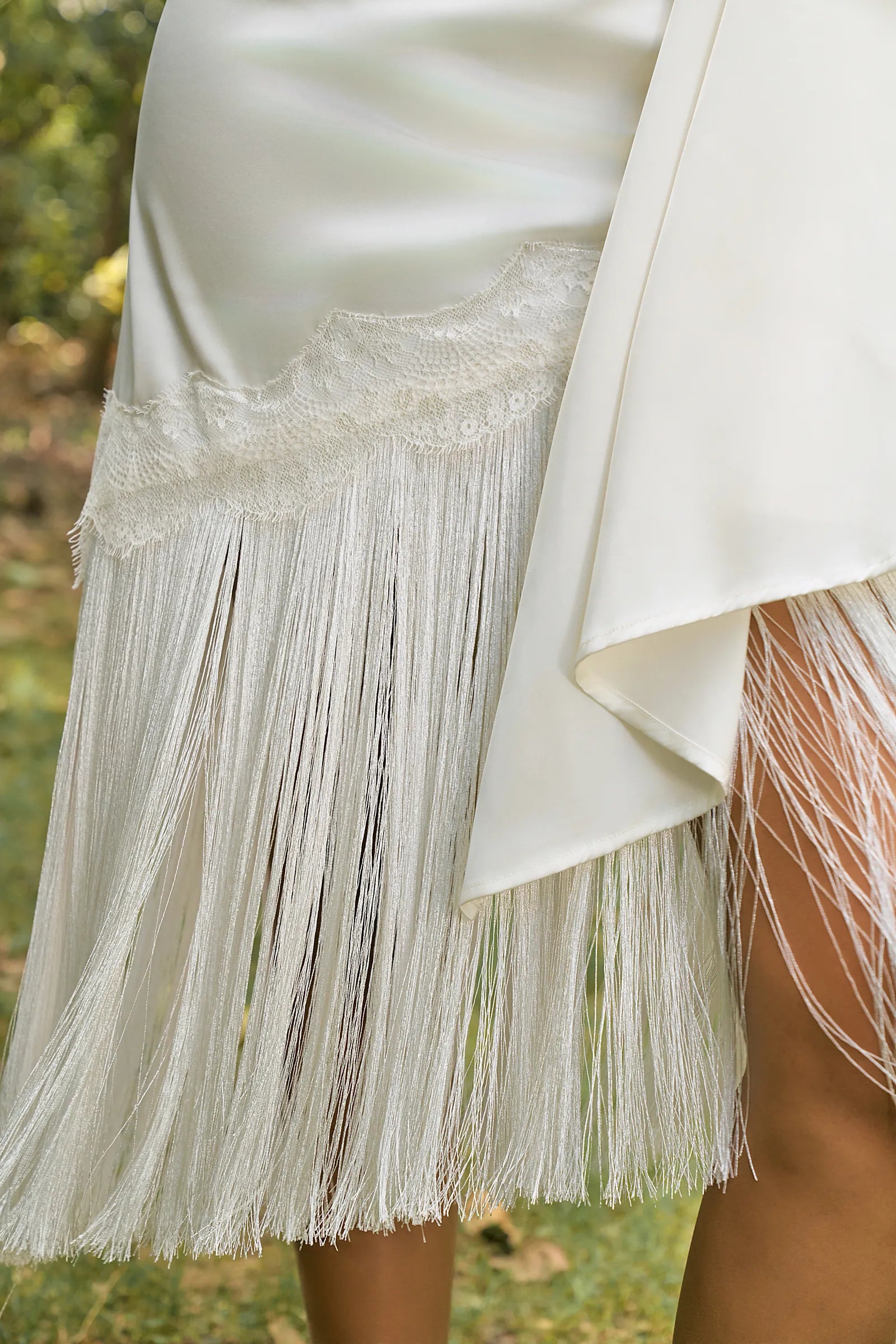 D'muri The Fringe Salon Skirt close-up of fringe trim and fabric movement