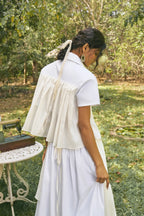 D'muri The Pleated Bodice Top three-quarter view, sculptural pleated bodice