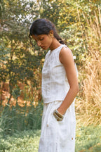 D'muri The Jacquard Day Blouse three-quarter view, textured woven blouse